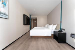 Fotografie z fotogalerie ubytování Bernard Hotel Putian Xinghuafu Historical and Cultural Street Branch v destinaci Putian + 21 fotografií