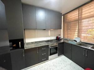 Η κουζίνα ή μικρή κουζίνα στο Oceanic-Supreme Standard Spaces