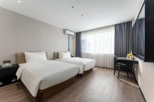 Fotografie z fotogalerie ubytování Bernard Hotel Putian Xinghuafu Historical and Cultural Street Branch v destinaci Putian