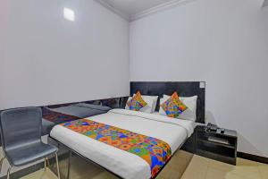 Postel nebo postele na pokoji v ubytování FabHotel Silver Star + 18 fotografií