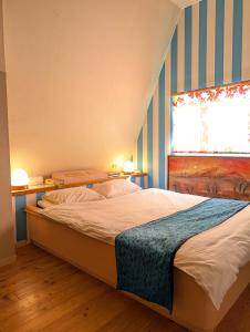 Voodi või voodid majutusasutuse 南の楽園 toas