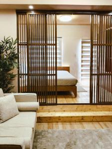 Ένα ή περισσότερα κρεβάτια σε δωμάτιο στο Condo Near Mactan Cebu Airport