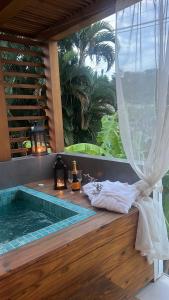 Bazén v ubytování Home Aguas da barra Ilhabela nebo v jeho okolí