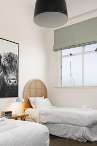 Photo de la galerie de l'établissement Renovated 3BR Apartment in CBD, à Gisborne