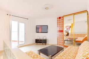 TV a/nebo společenská místnost v ubytování Apartamento cerca de la playa