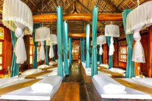 Postel nebo postele na pokoji v ubytování Central Hills Pu Luong Resort