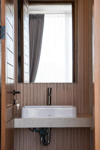 Koupelna v ubytování Swamis Villa