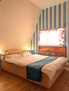 Voodi või voodid majutusasutuse 南の楽園 toas