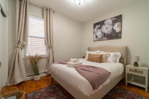 Postel nebo postele na pokoji v ubytování The Boulevard Stay! 25 mins to NYC! Spacious 2BR! + 15 fotografií