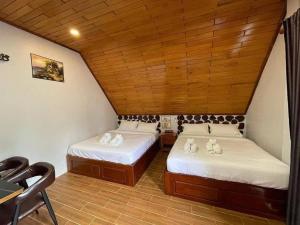 Postel nebo postele na pokoji v ubytování FCC Mondulkiri Resort