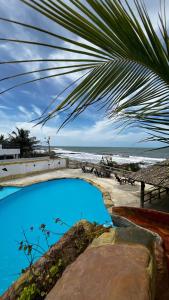 Bazén v ubytování Seaside cabin in Arboletes Galilea nebo v jeho okolí + 4 fotografie