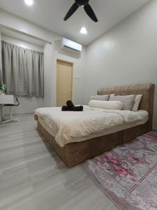 Ένα ή περισσότερα κρεβάτια σε δωμάτιο στο De Suria Homestay Jitra- 3BR with 4 Aircons