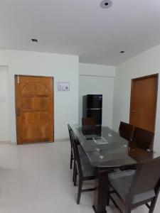 TV a/nebo společenská místnost v ubytování Chiakunja