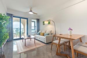 Postel nebo postele na pokoji v ubytování Hexu Yanju Hotel