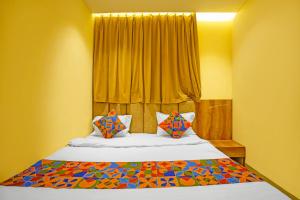 Voodi või voodid majutusasutuse FabHotel Shri Shubh Palace toas +14 fotot