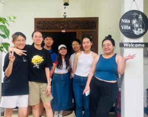 a group of people standing in front of a door at Nila Villa in Galle +47 photos