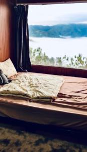 Ένα ή περισσότερα κρεβάτια σε δωμάτιο στο Homestay26