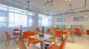 Posezení v ubytování City Comfort Inn Taizhou International Exhibition Center