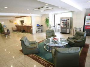 a lobby with chairs and a table in a store at Hashimoto Park Hotel in Sagamihara