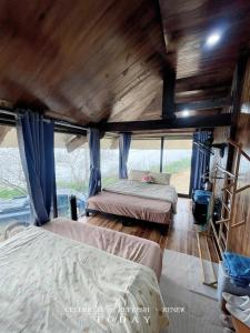 Ένα ή περισσότερα κρεβάτια σε δωμάτιο στο Homestay26