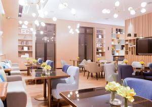 Posezení v ubytování Echarm Hotel Huangshi Yingbin Avenue