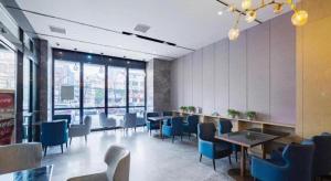 Posezení v ubytování Echarm Hotel Wuhan Huangpi Xiangyang Avenue