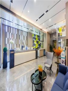 Posezení v ubytování Echarm Hotel Wuhan Huangpi Xiangyang Avenue