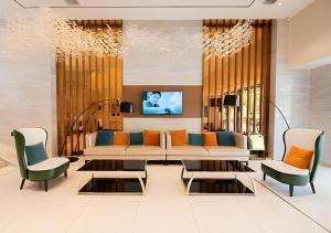 TV a/nebo společenská místnost v ubytování City Comfort Inn Kunming Xinluojiu Bay Guangju Road