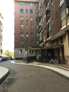 a group of bikes parked next to a building at Casa Luca in Milan