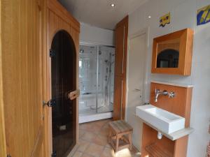 a bathroom with a sink and a shower at Villa in Middelkerke near the Beach in Middelkerke