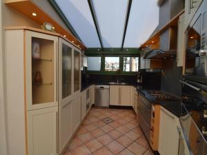a large kitchen with a large skylight at Villa in Middelkerke near the Beach in Middelkerke