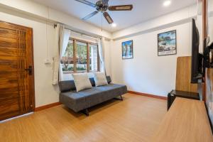 TV a/nebo společenská místnost v ubytování The Banyan House