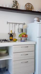 Kuchyň nebo kuchyňský kout v ubytování Loft Profumo di Mare
