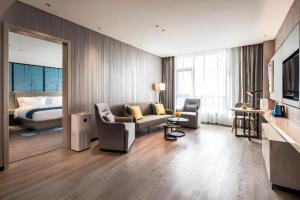 Μια τηλεόραση ή/και κέντρο ψυχαγωγίας στο Echarm Hotel Torch Development Zone Zhongshan Station