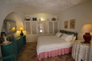 Posteľ alebo postele v izbe v ubytovaní House Cueva del Mar
