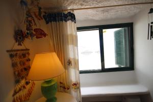 Posteľ alebo postele v izbe v ubytovaní House Cueva del Mar