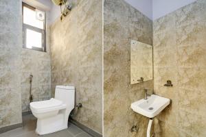 Ένα μπάνιο στο Hotel O Sector 3 Ghaziabad Formerly Cloud Inn