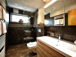 Koupelna v ubytování Appartements & Chalets Wiesenruh