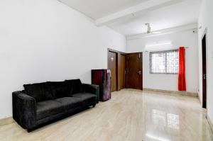 Χώρος καθιστικού στο Hotel O Cosmopolis Bhubaneswar Formerly Luxury Stay