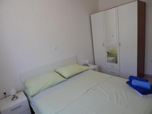 Postel nebo postele na pokoji v ubytování Apartments Sofija