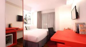 TV a/nebo společenská místnost v ubytování The Silk at Dago Boutique Hotel