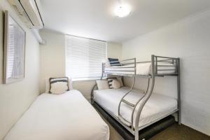 Ένα ή περισσότερα κρεβάτια σε δωμάτιο στο Superbly Situated Noosa Heads +19 φωτογραφίες