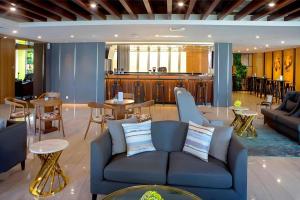 Posezení v ubytování Hotel Dafam Pacific Caesar