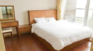 Postel nebo postele na pokoji v ubytování Mungyeong saejae Resort