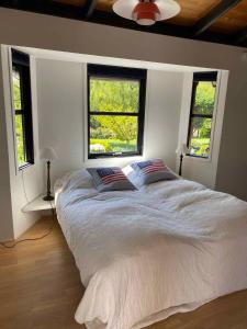 En eller flere senge i et værelse på Veddinge Odsherreddenmark - House With Seaview