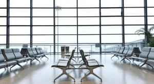 a room with chairs and a table in an airport at GreenTree Inn Shanghai National Convention and Exhibition Center Huaxiang Road in Shanghai