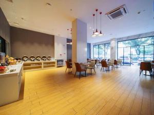 Posezení v ubytování Borrman Hotel Zhaoqing Sihui Tianguangxu Jade City