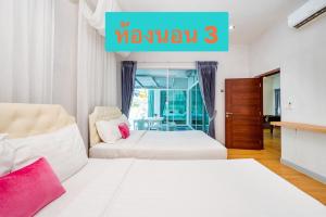 Postel nebo postele na pokoji v ubytování Tripple P Pool Villa ชะอำ + 16 fotografií