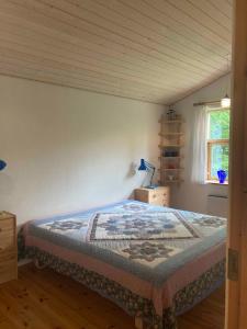 Voodi või voodid majutusasutuse Cozy Holiday Home Near Beach And Town Life toas