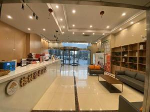 Posezení v ubytování GreenTree Inn Taizhou New District Hospital of Renmin Hospital Mingliu Express Hotel